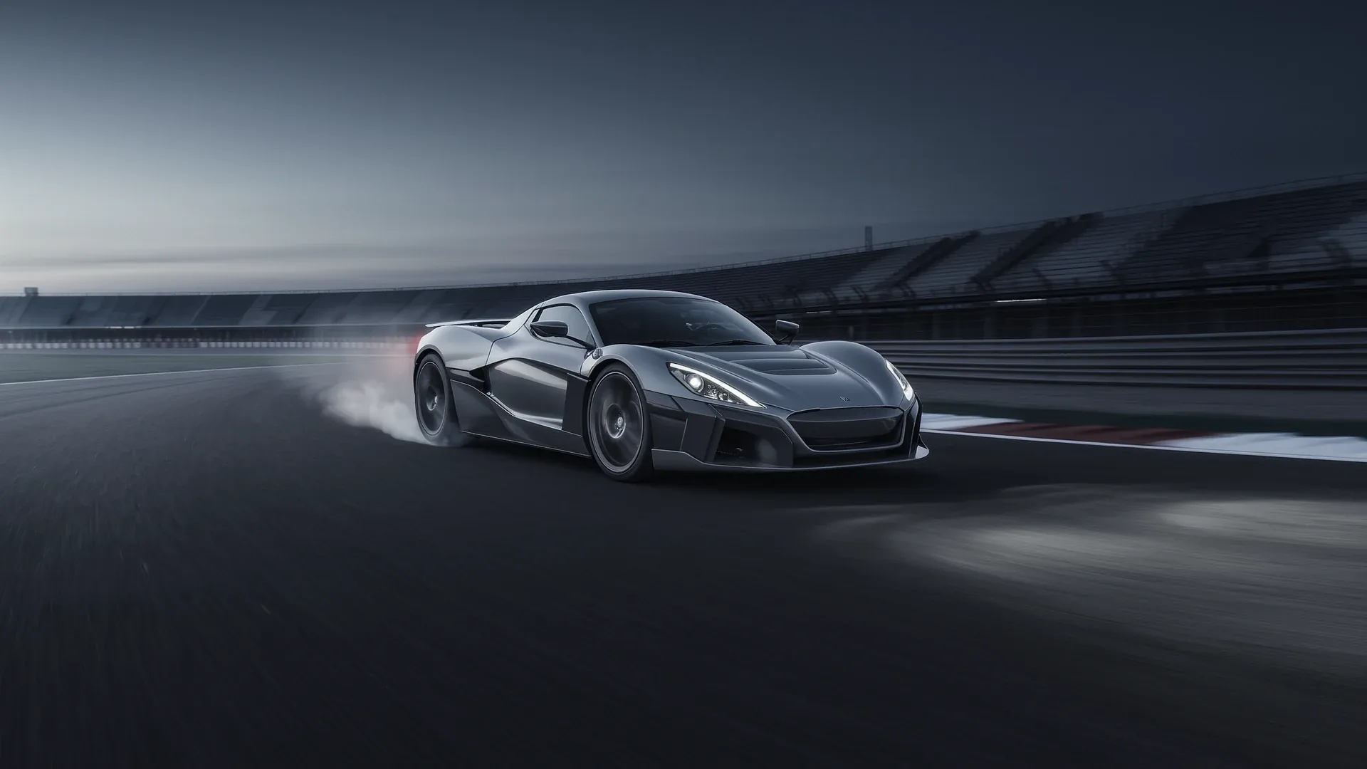 A supercar on a wet circuit with spray rising behind it