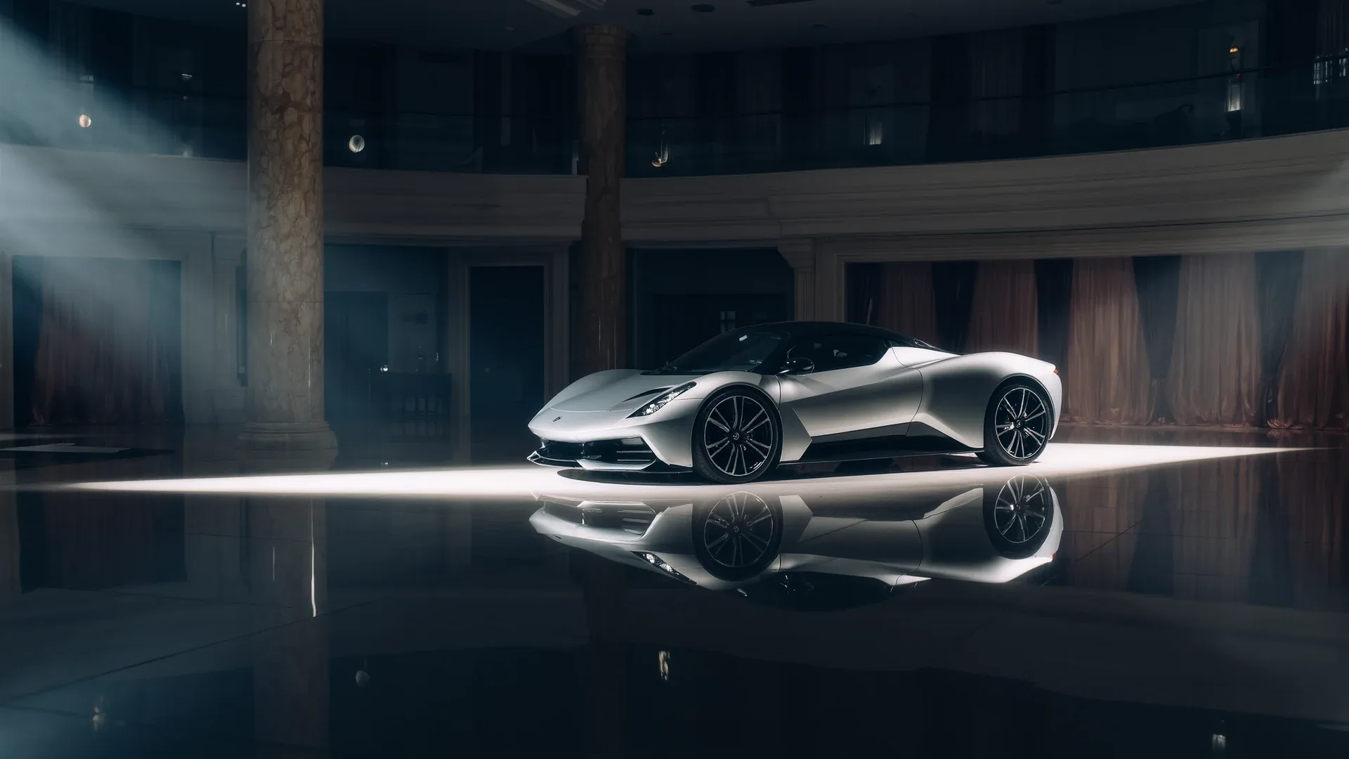 A supercar in a dark hall lit by a single band of light